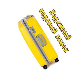 Пластиковый чемодан на четырех колесах сочно-лимонный