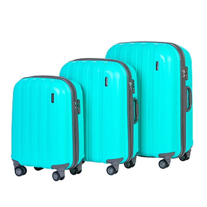 Пластиковый чемодан на четырех колесах бирюза